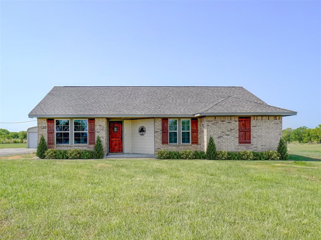 front view of house with a yard