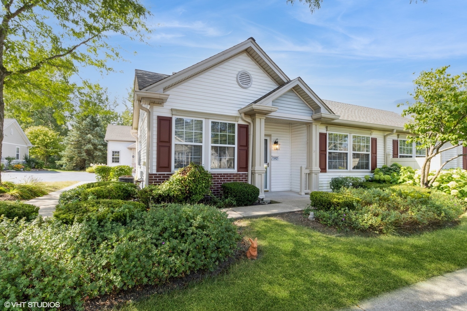 a view of front of house with a yard