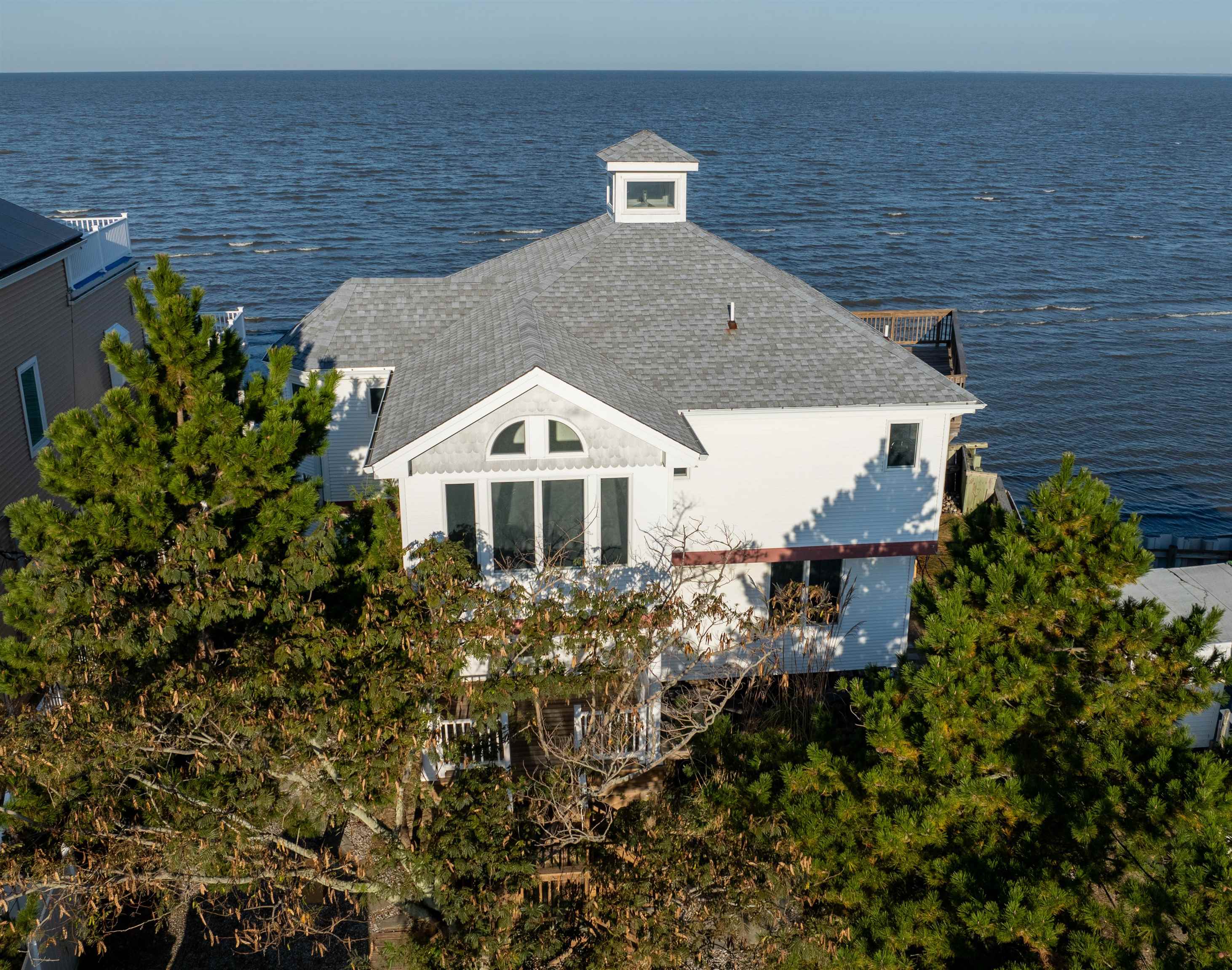 a aerial view of a house with a yard