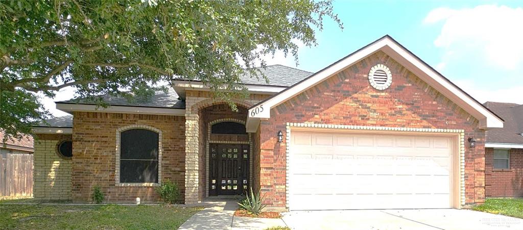 View of front of home with a garage