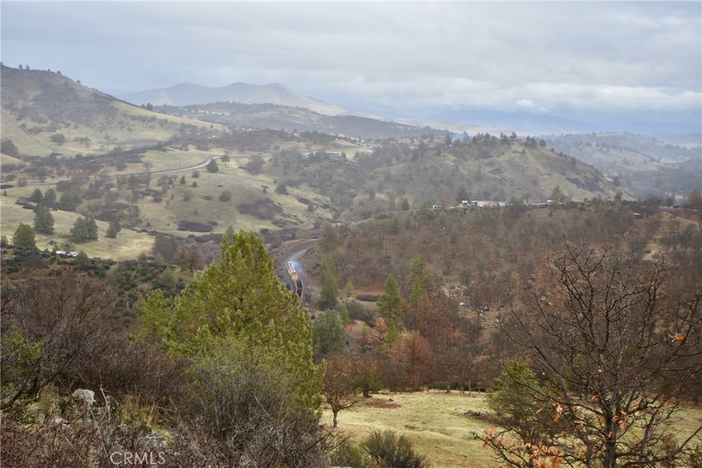 a view of mountain view with mountains in the background