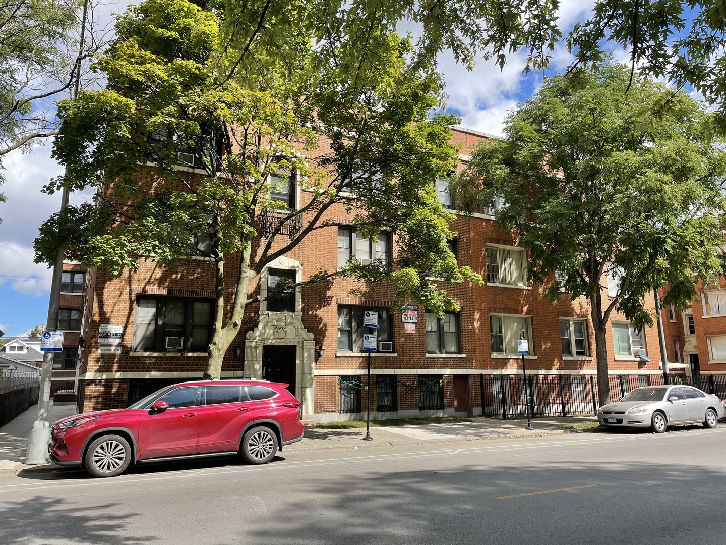 a cars parked in front of a building