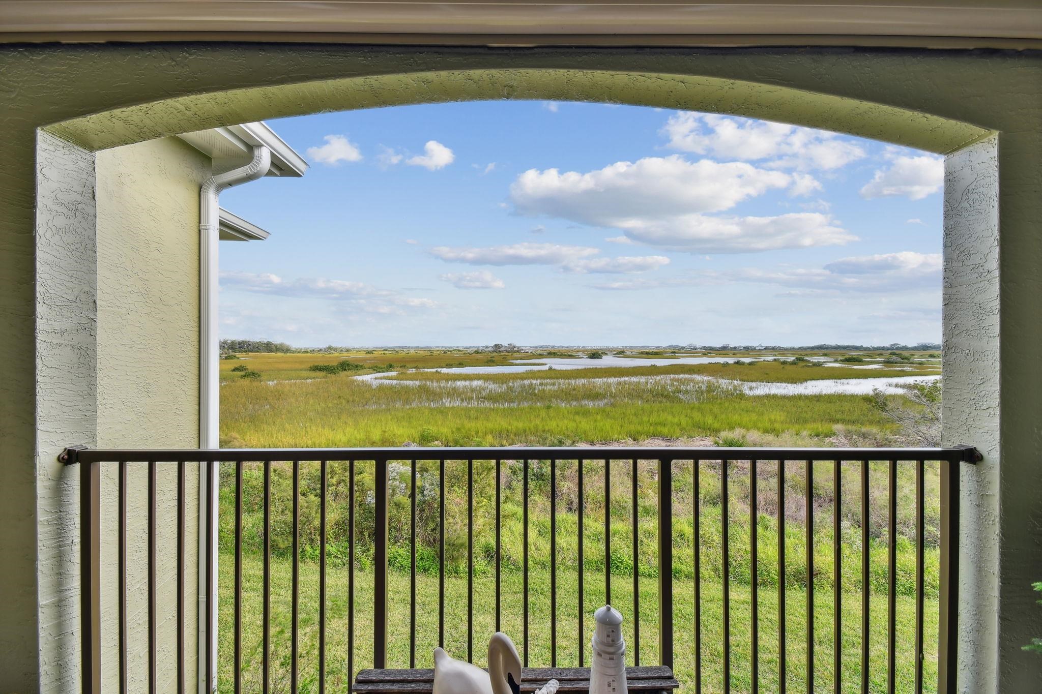 a view of ocean from a balcony