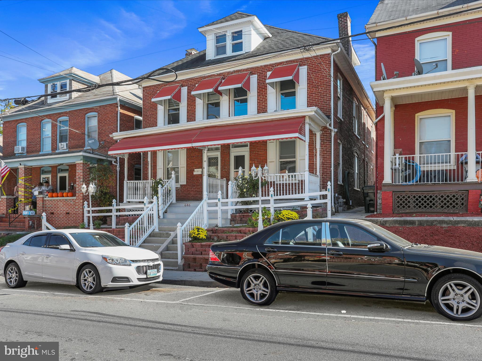 a car parked in front of a house