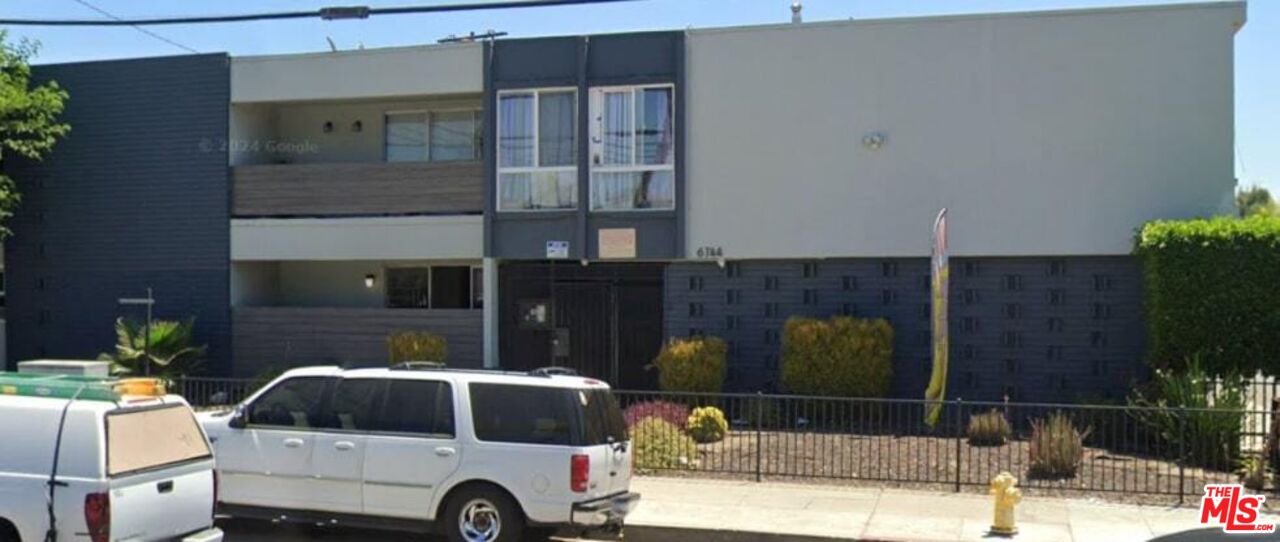 a car parked in front of a building