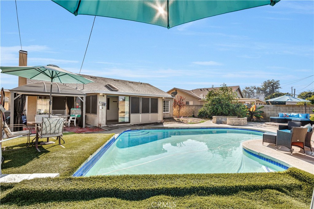 a view of a house with swimming pool