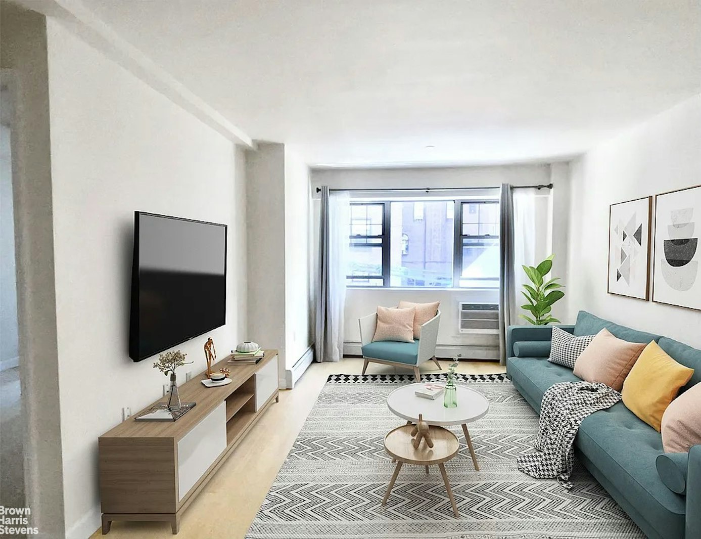 a living room with furniture and a flat screen tv