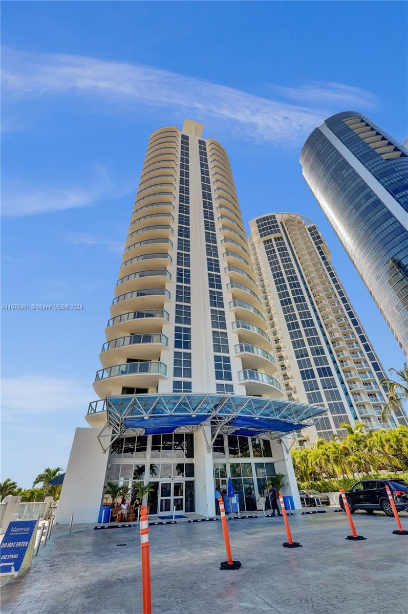 a front view of a building with street view