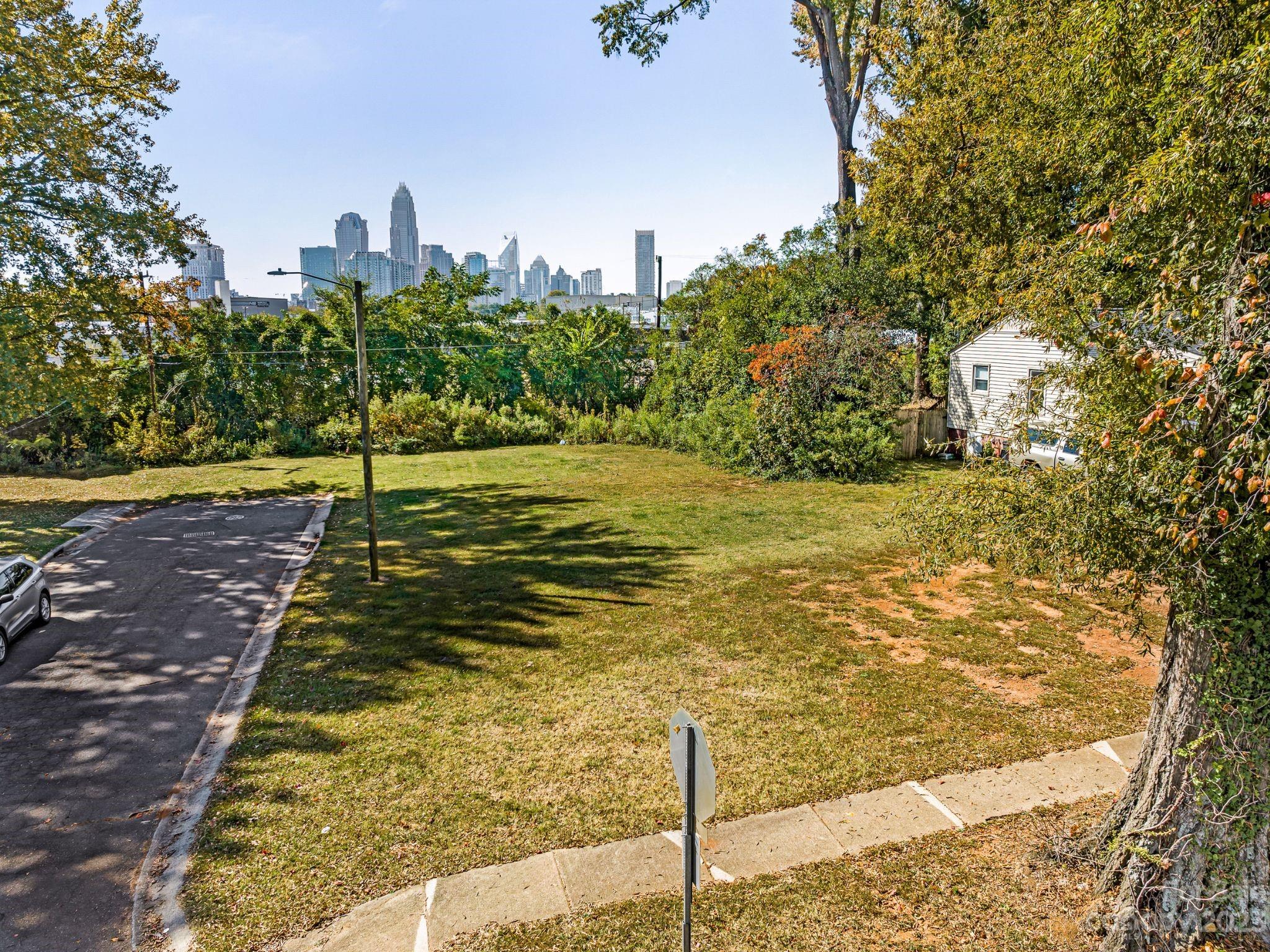 a view of a yard with an ocean view