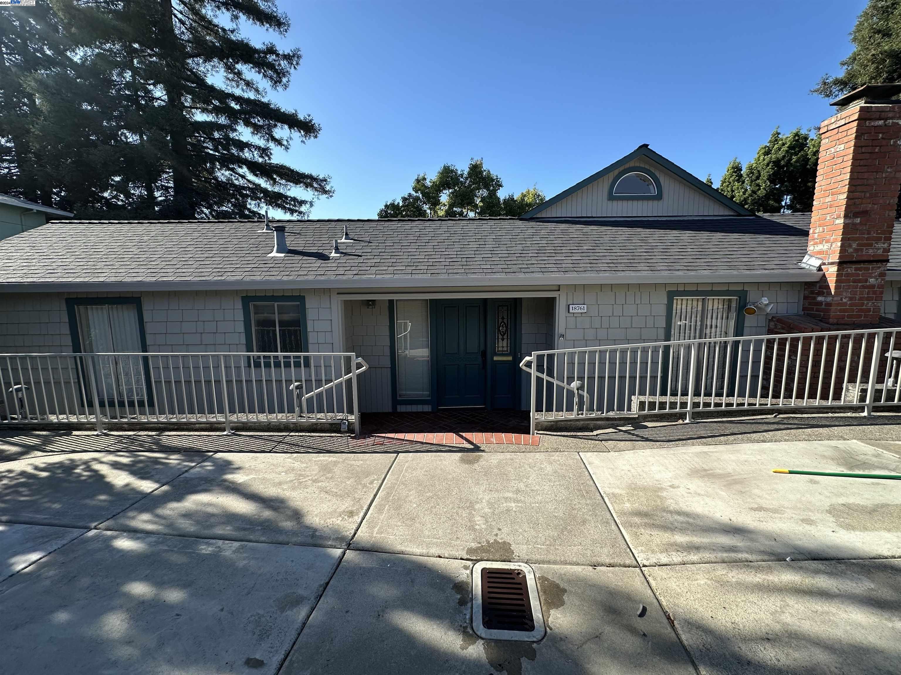 a front view of a house with a porch