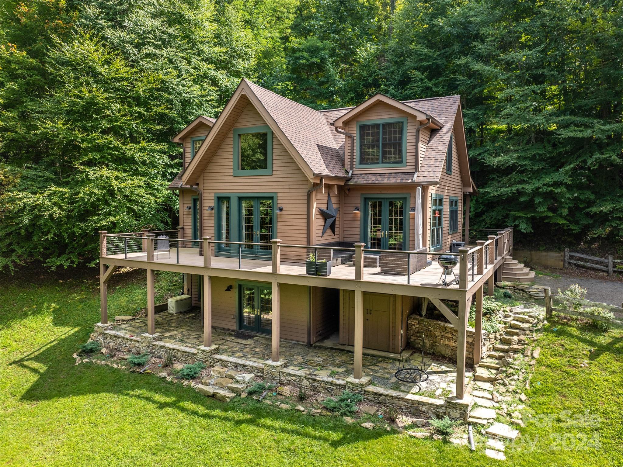 a front view of a house with swimming pool