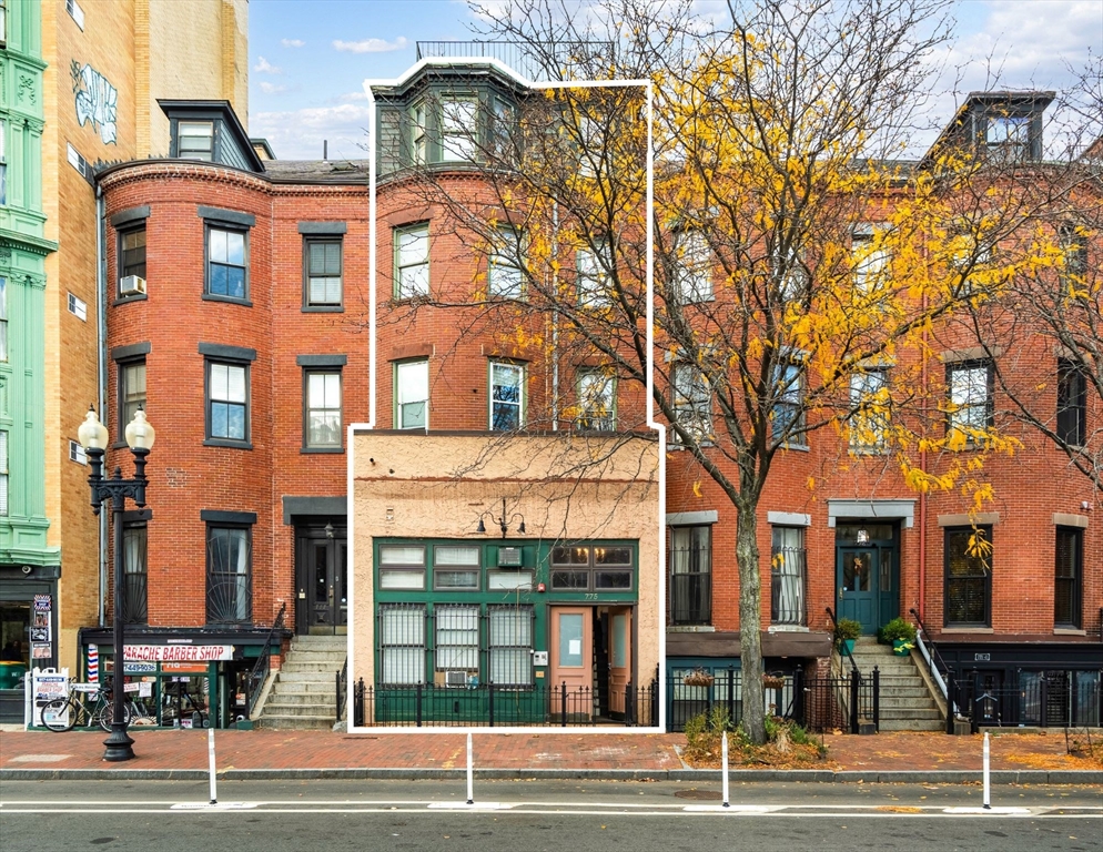 a view of a building and a street