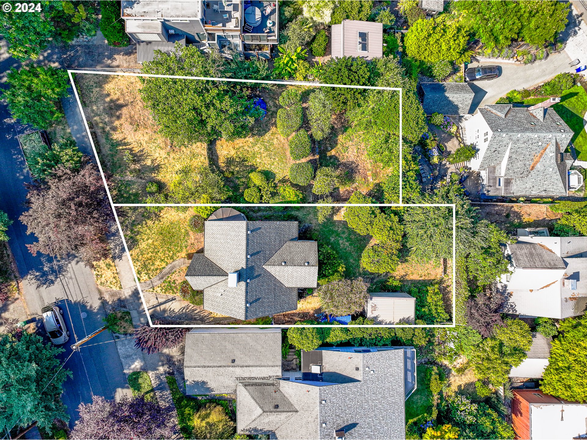 an aerial view of houses with outdoor space