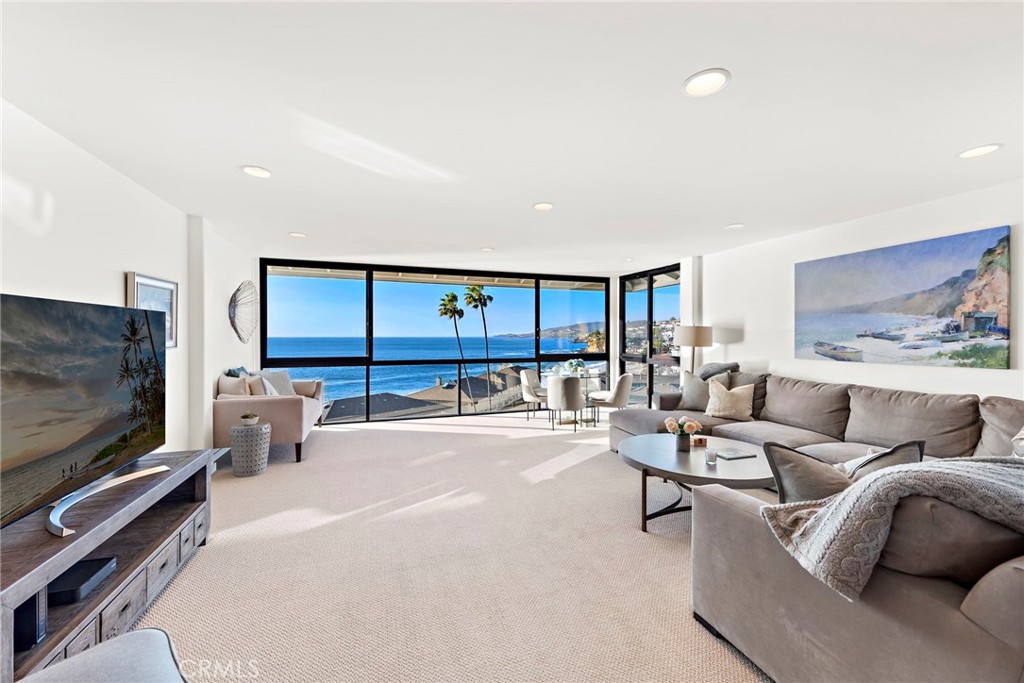 Stunning sunlit corner living room & dining