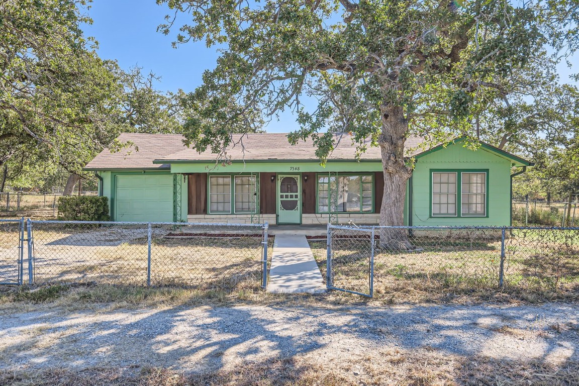 a front view of a house with a patio