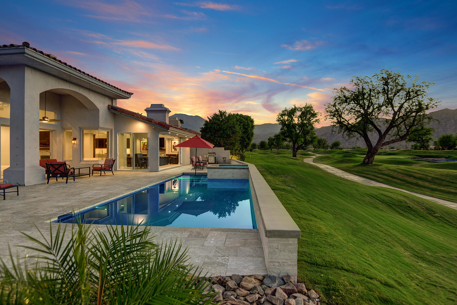 a view of a house with a swimming pool