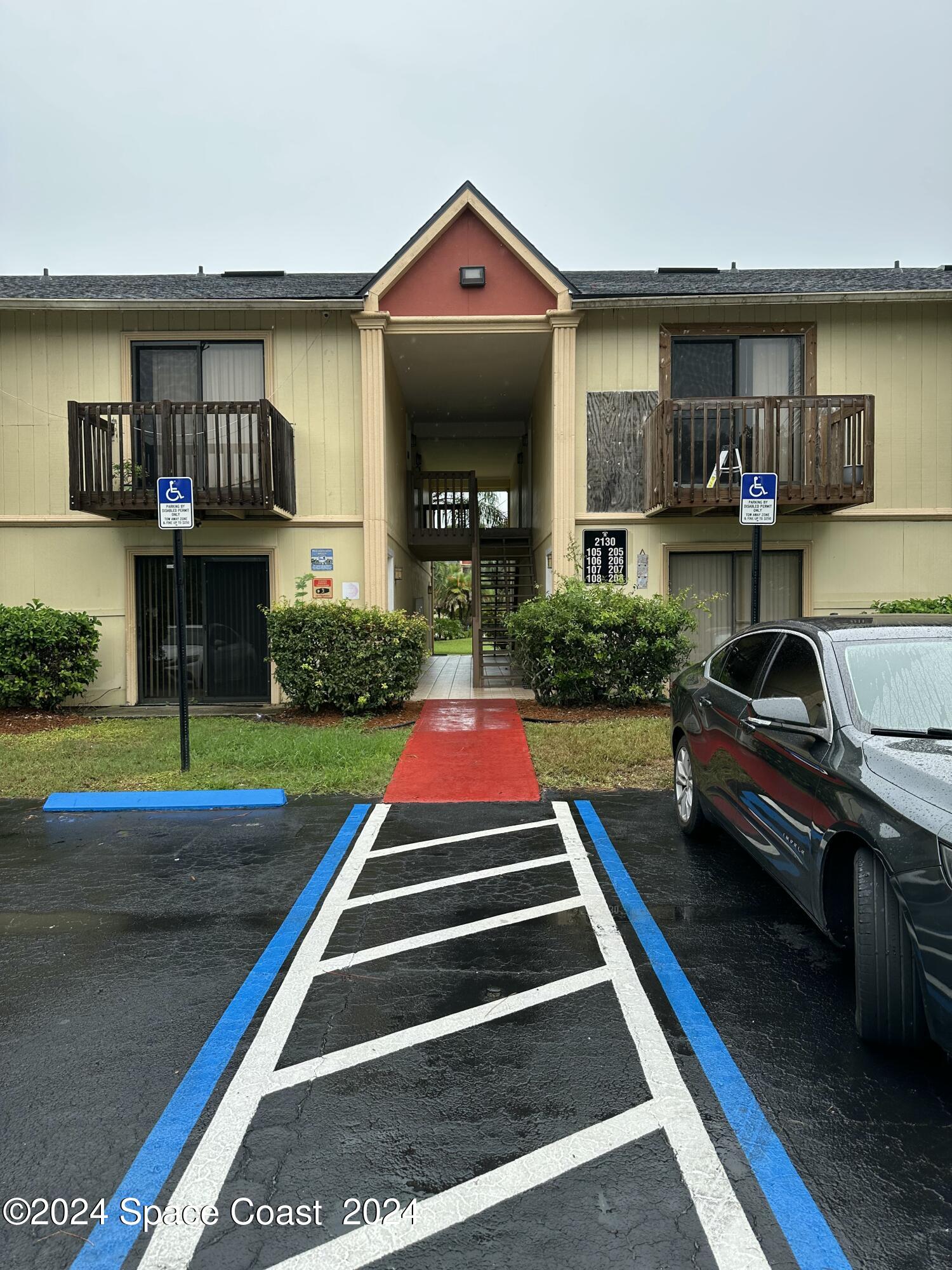 a front view of a house with yard