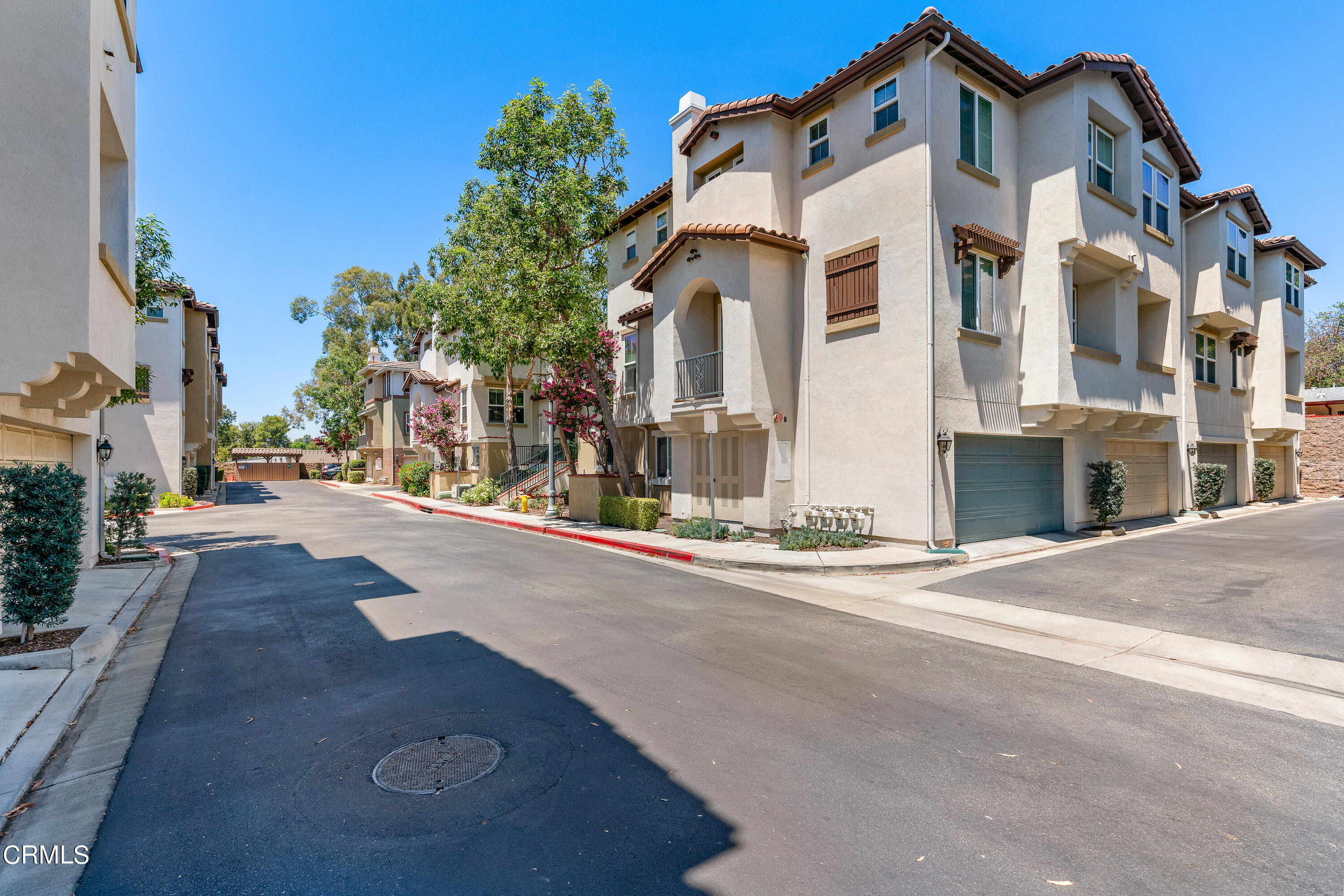 a view of a house with a street