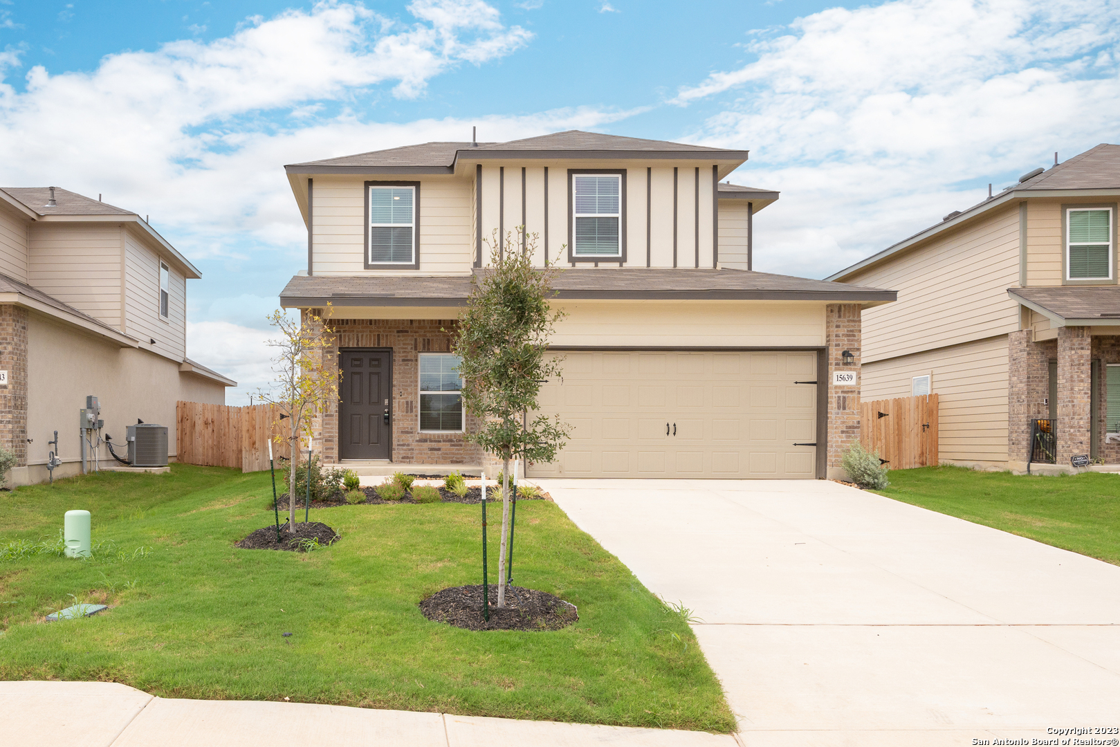 a front view of house with a yard