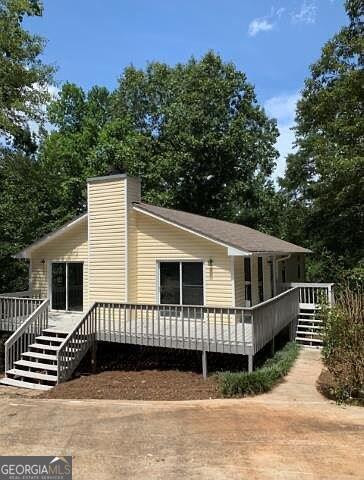 a view of a house with a roof deck