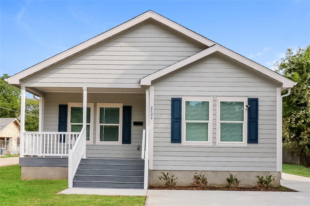 a front view of a house with a porch