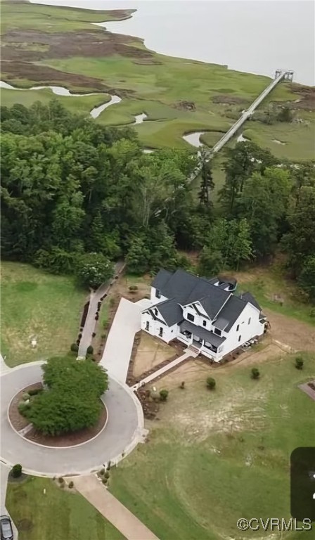 a view of a lake with a yard