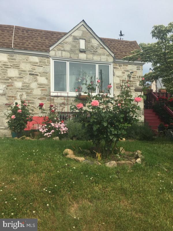 a view of a house with a garden