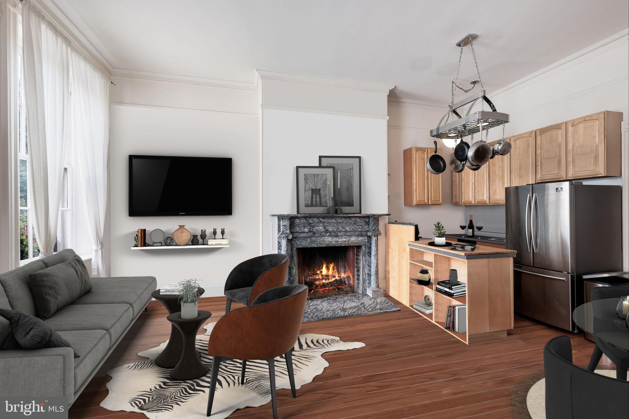 a living room with furniture fireplace and flat screen tv