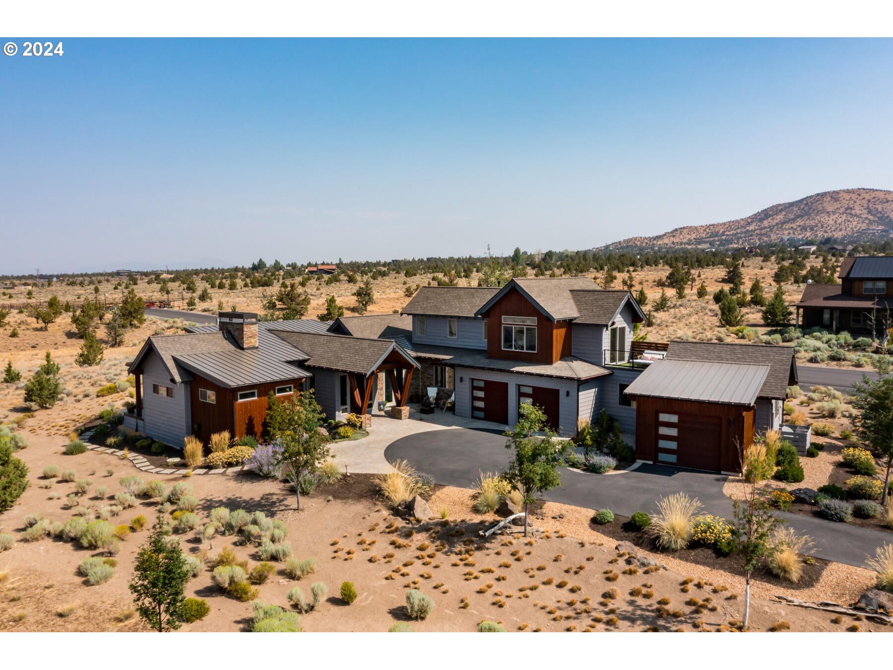 a aerial view of a house with a patio