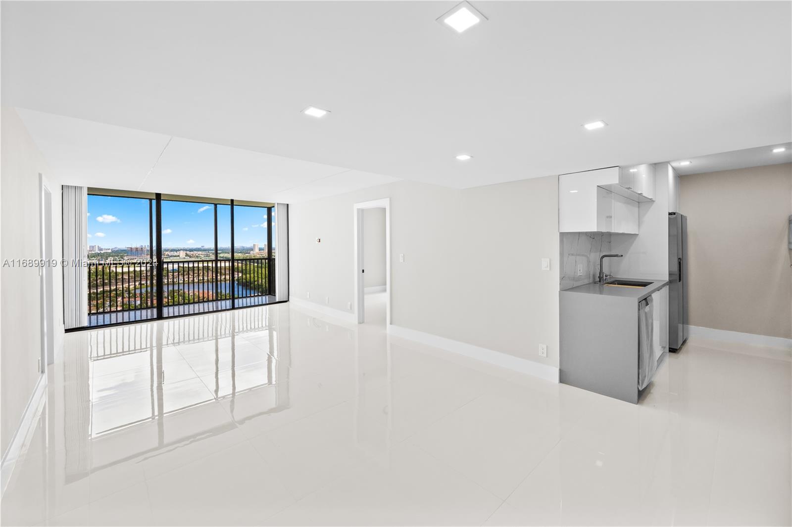 a view of a kitchen with a sink