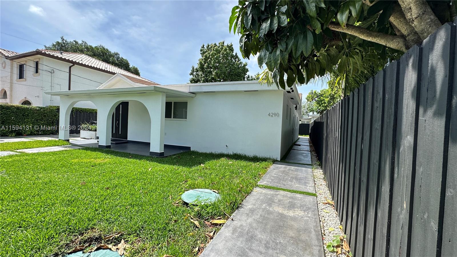 a front view of house with yard