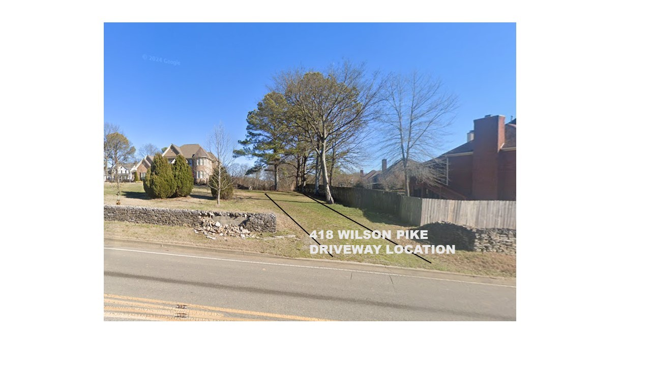 a picture of a bench in front of a building