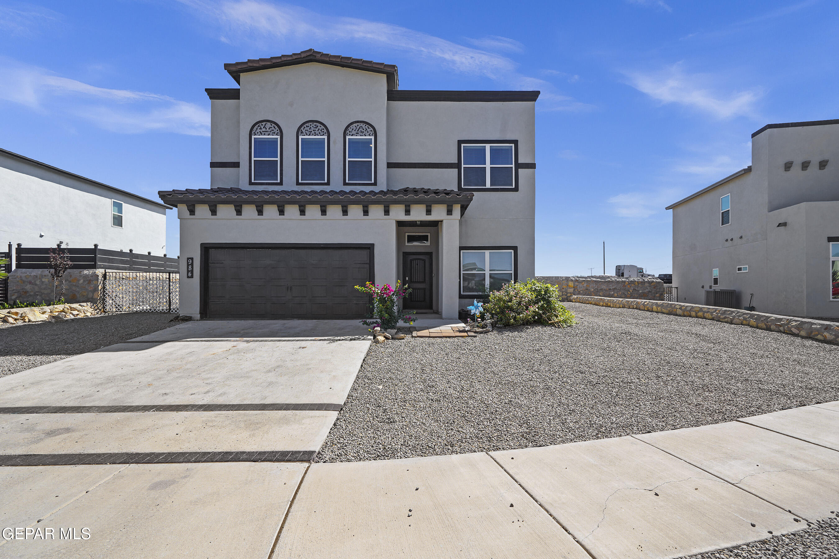 a view of a house with a street