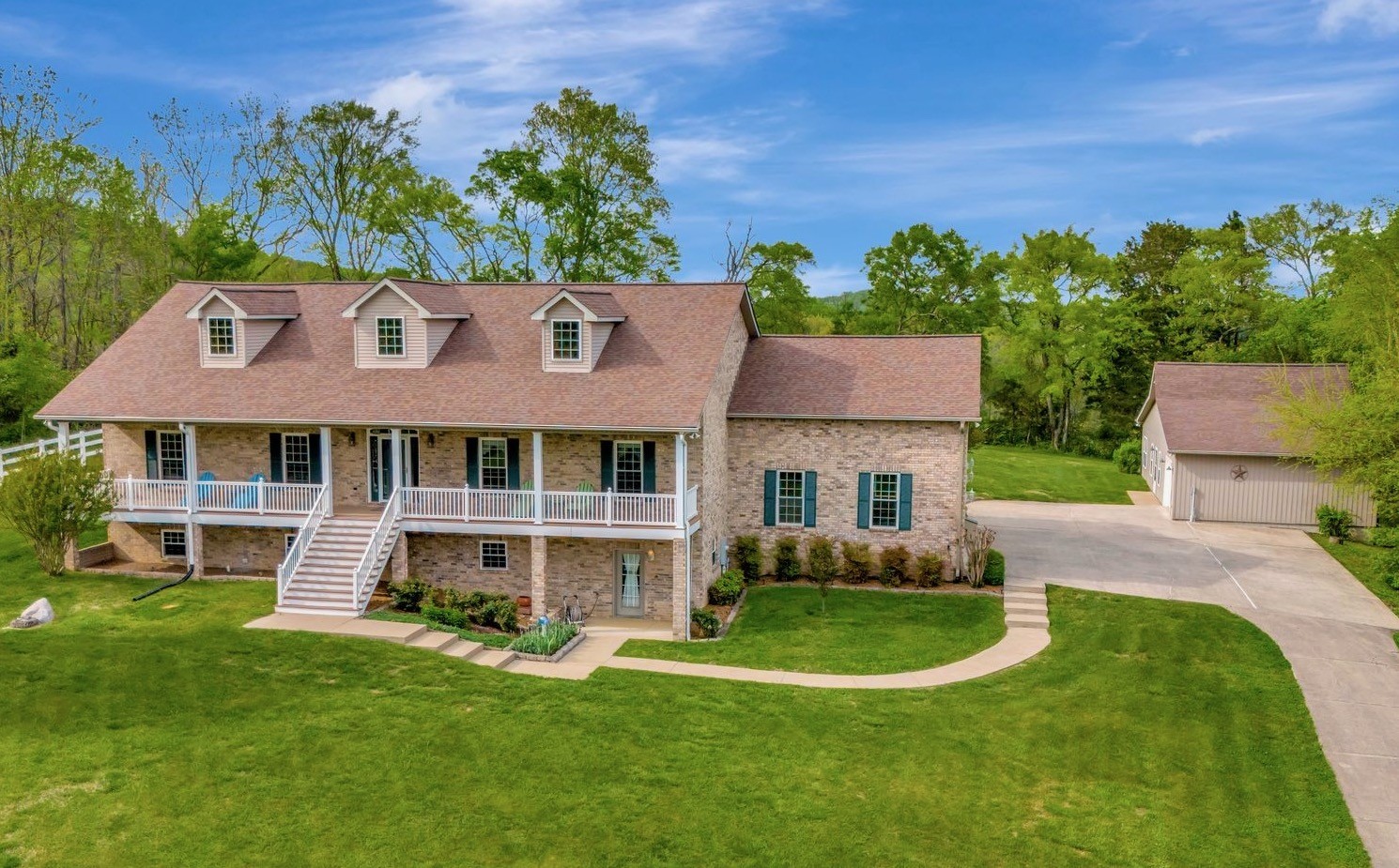 front view of a house with a yard