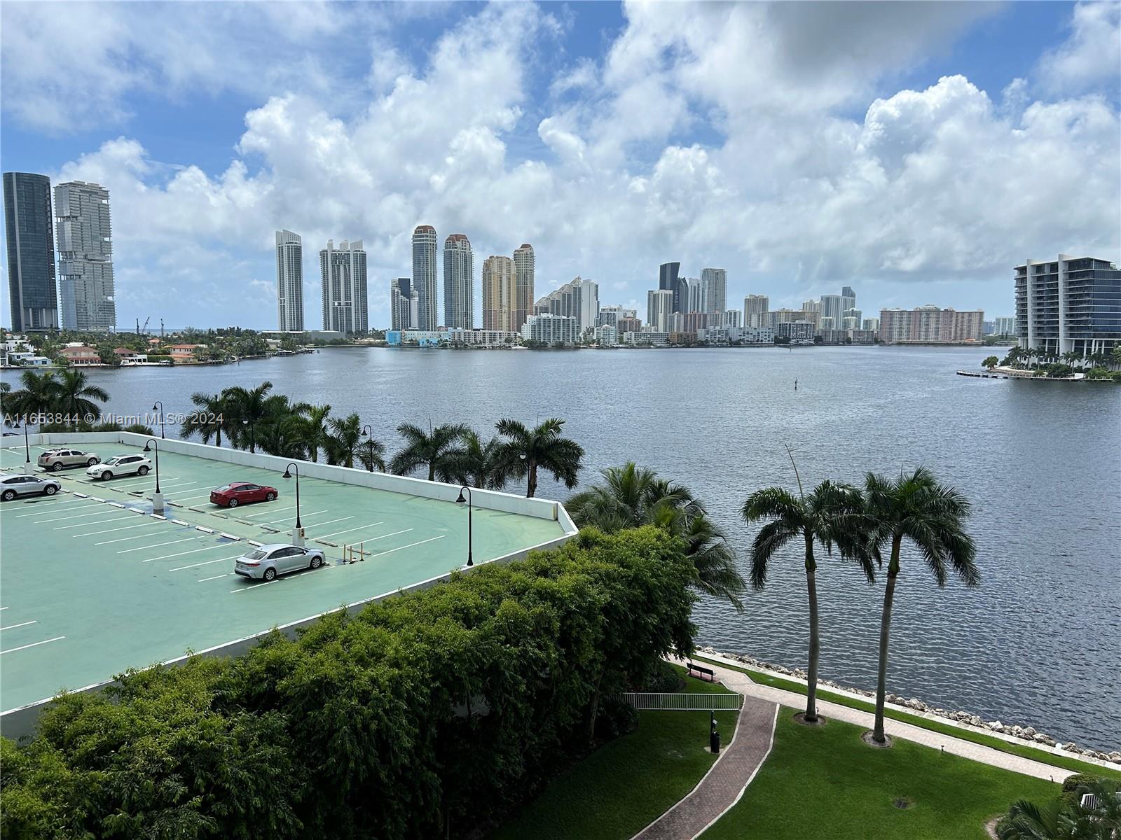 a view of a lake and a yard