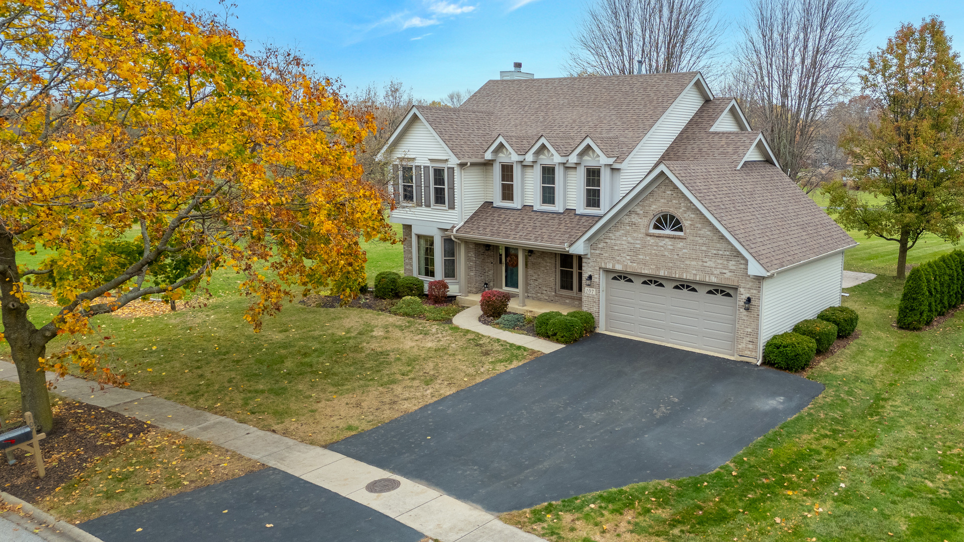 front view of house with a yard