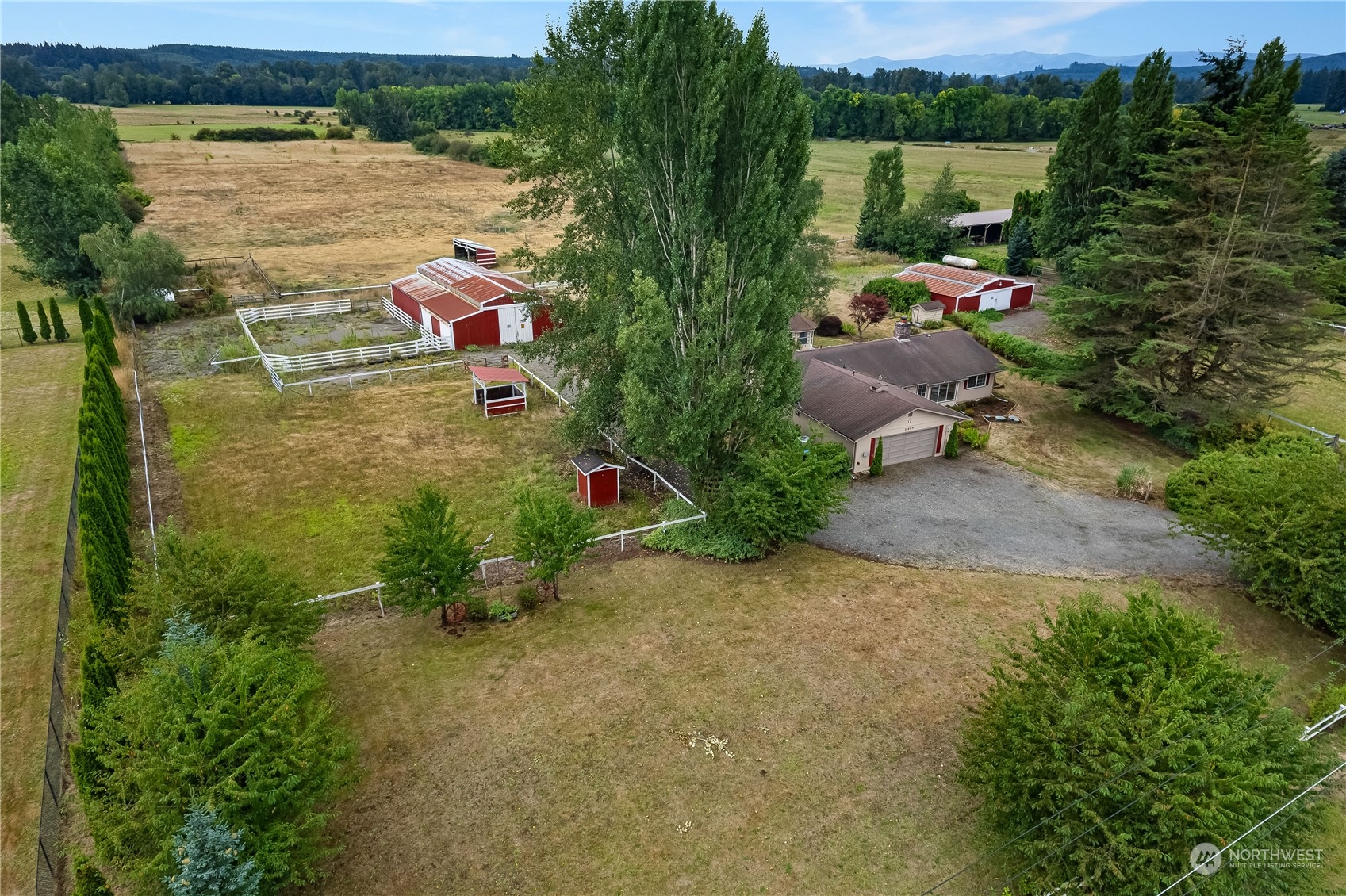 an aerial view of a house with lake view