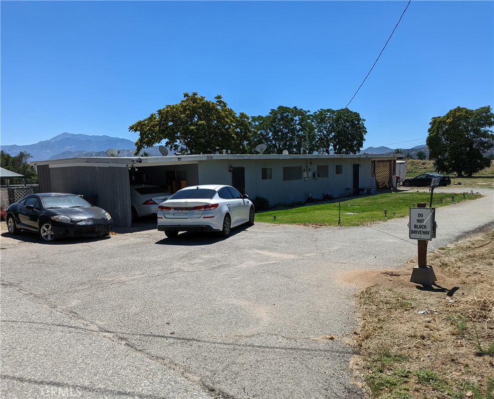 a car parked in front of a house