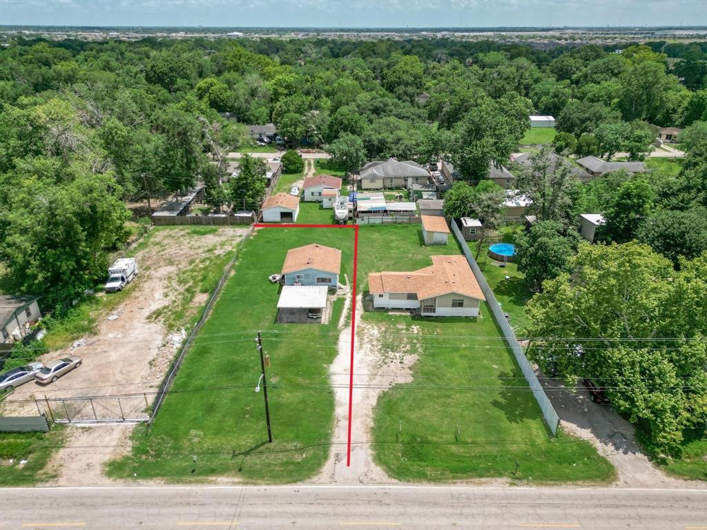 a view of yard with swimming pool