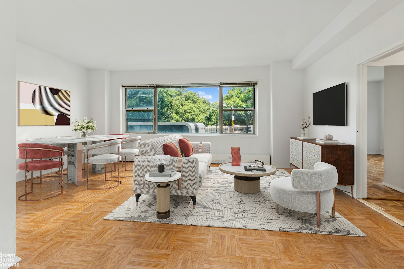 a living room with fireplace furniture and a flat screen tv