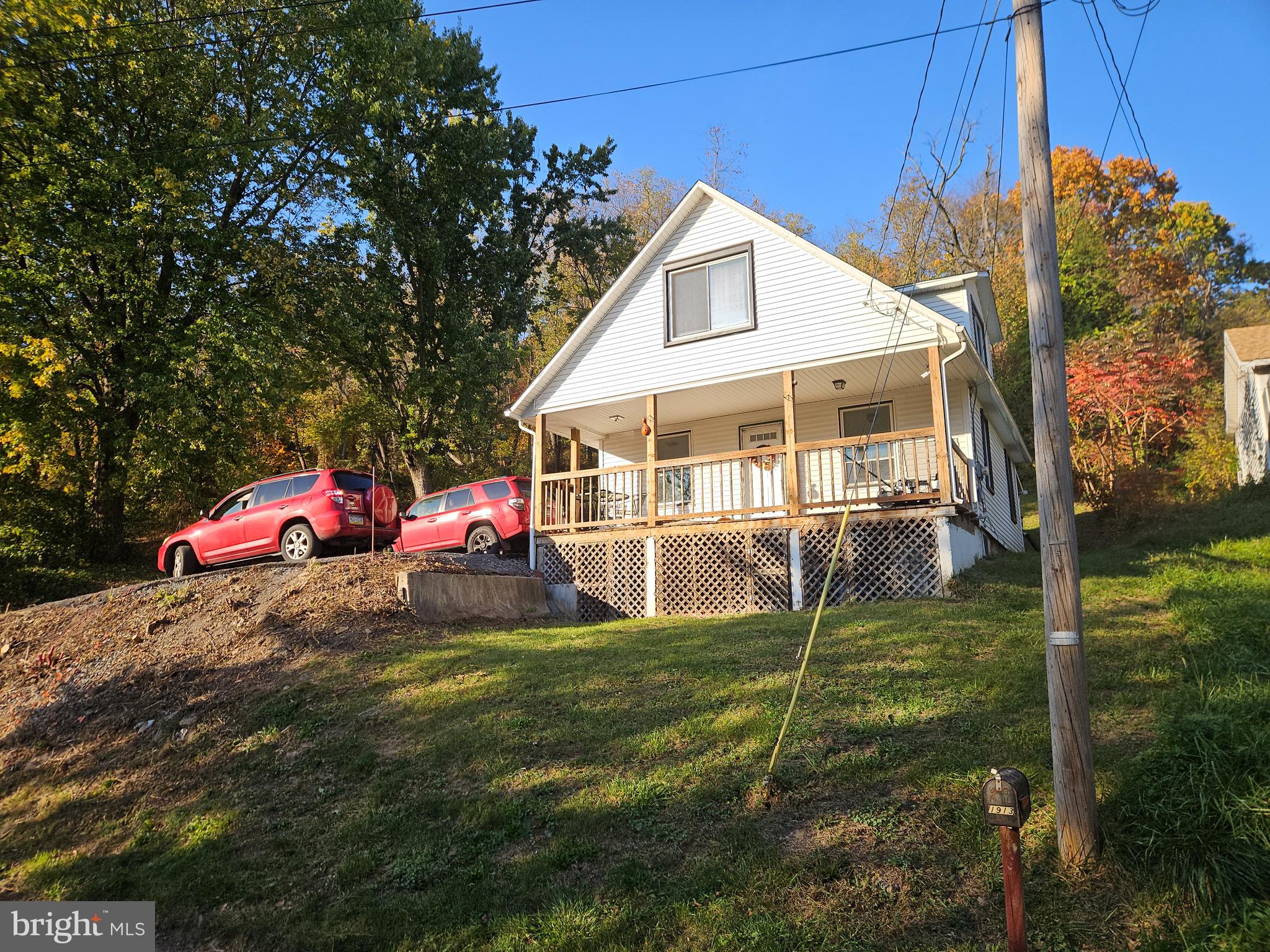 a house view with a backyard space