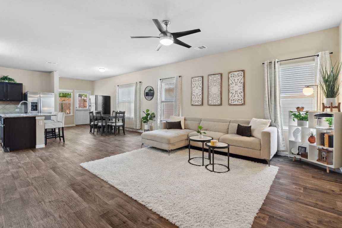 The bright and spacious open floor plan for the living room, kitchen and dining area provide seamless connectivity and are ideal for entertaining.