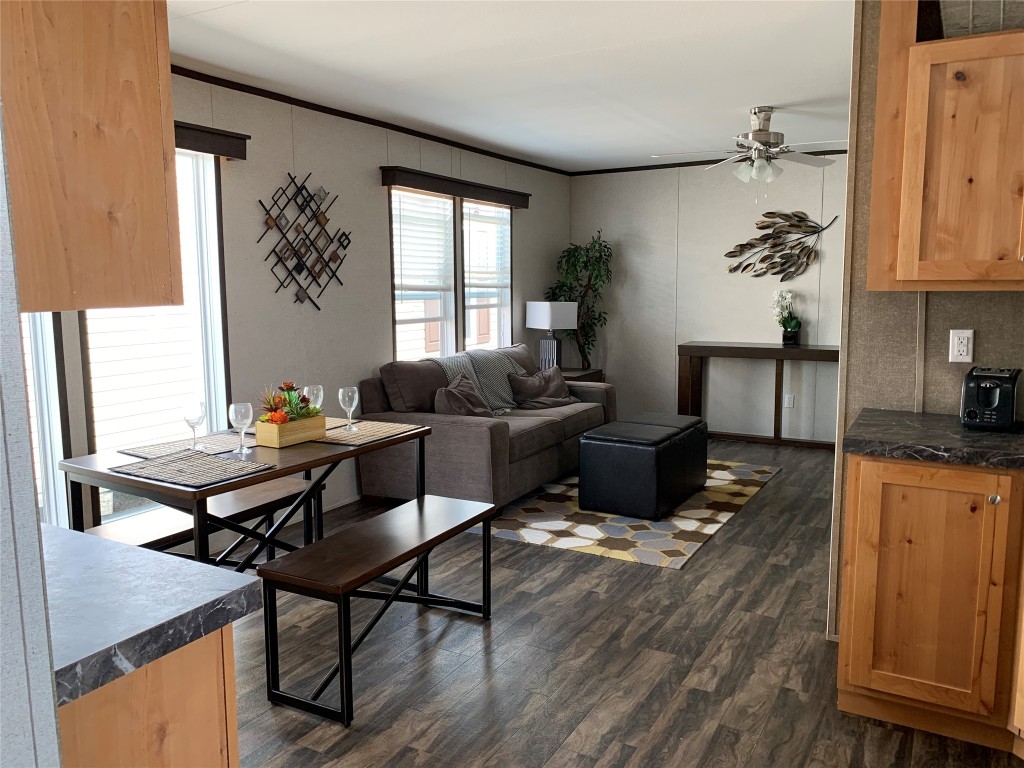 a living room with furniture and a window