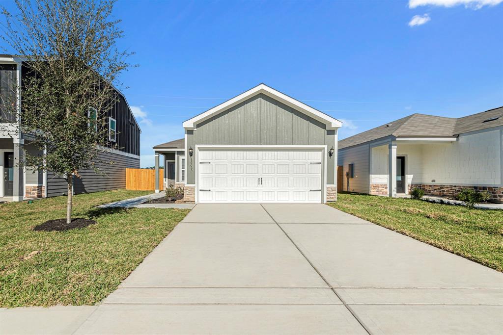 The stone and modern paint color provide great curb appeal for our homeowners.