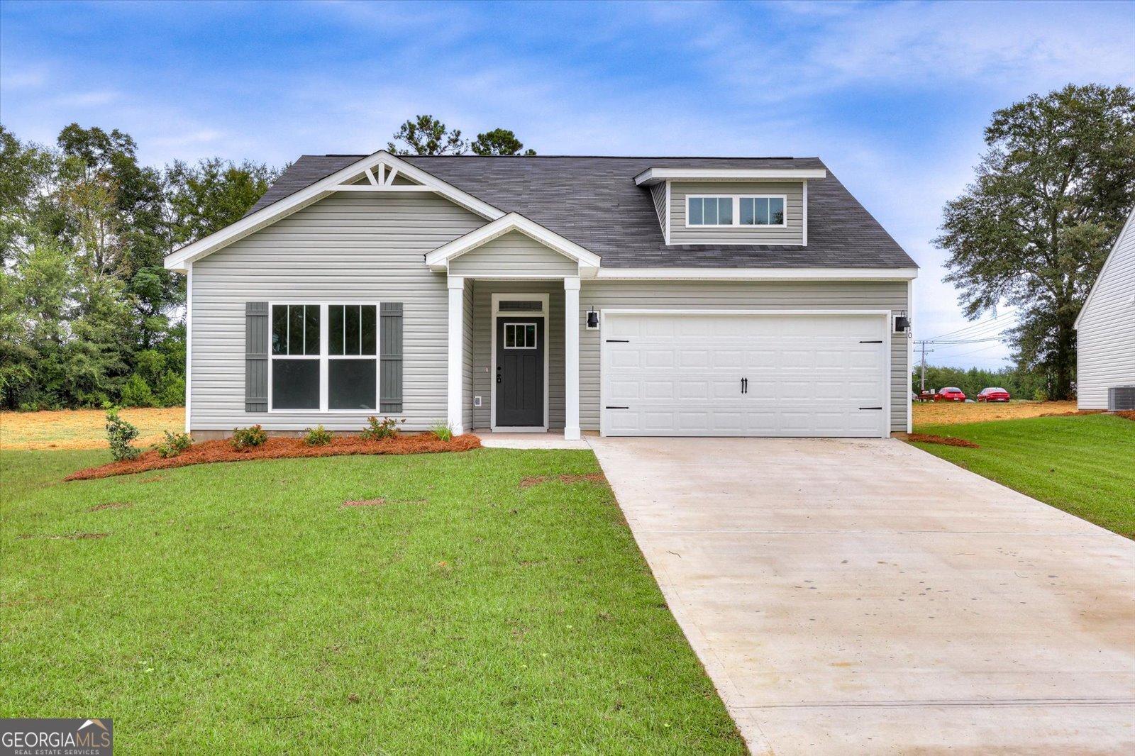 a view of outdoor space yard and front view of a house