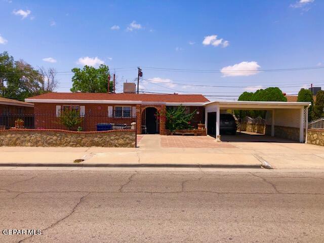 a front view of house with a yard