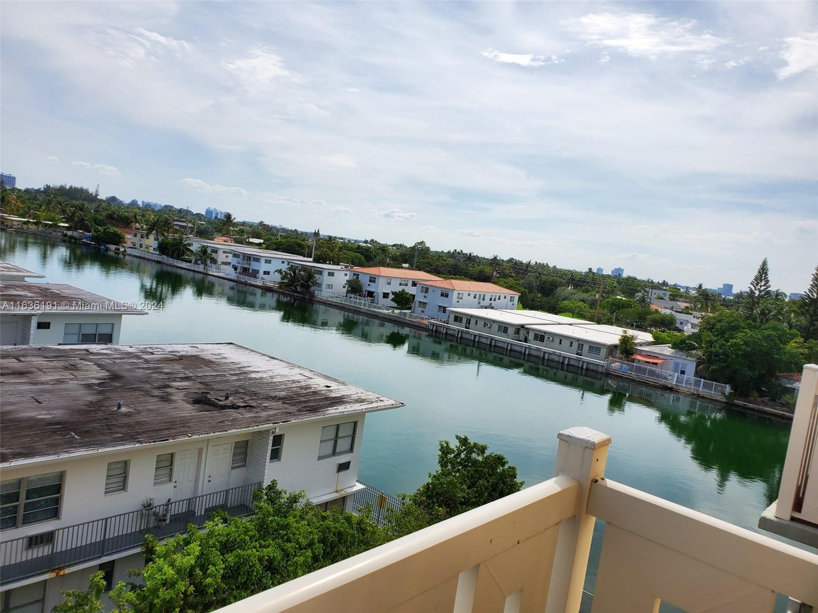 a view of a lake with a city