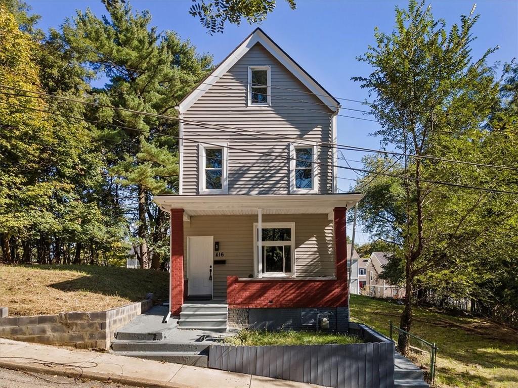 front view of house with a yard