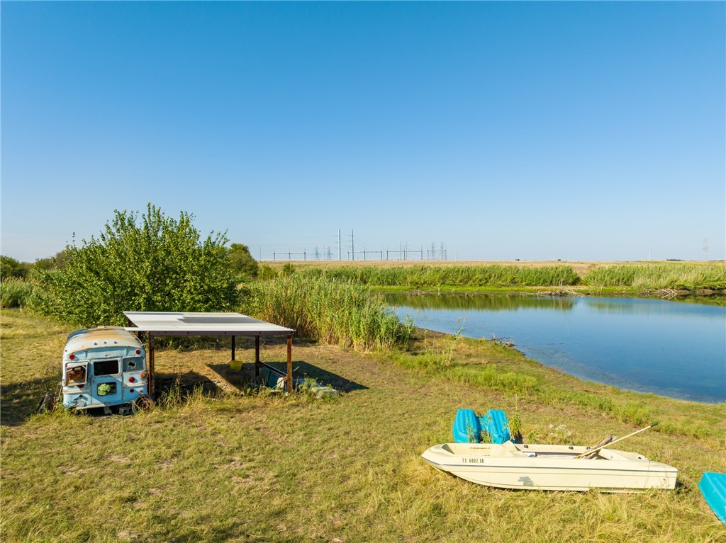 a view of a lake with a patio