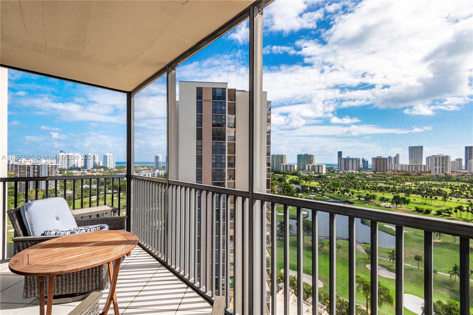 a balcony view with a city view